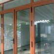 Top 10 giả gỗ mẫu cửa nhôm 2 cánh đẹp nhất dẫn đầu xu hướng kiến trúc 2026